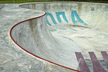 Outdoor skatepark ramp for skateboarding. Dobrich, Bulgaria