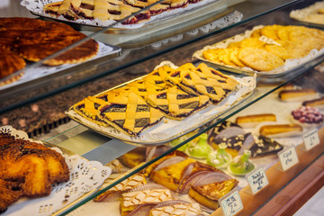  French traditional bakery pastry store in the center of AIX with diverse cakes and eclairs