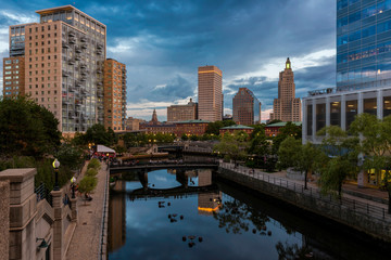 Fototapeta na wymiar Waterplace Park, the Woonasquatucket River and downtown Providence from the Martin Luther, Jr. Bridge in Providence, Rhode Island