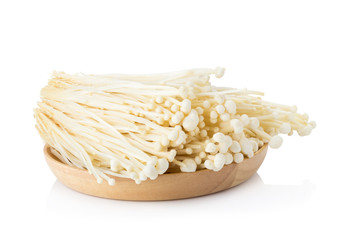 Fresh Enoki mushrooms on white background