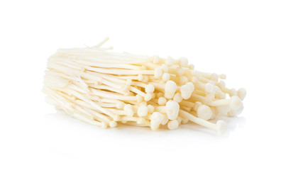 Fresh Enoki mushrooms on white background