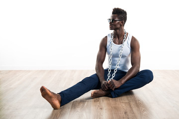 Handsome man with sunglasses and chains