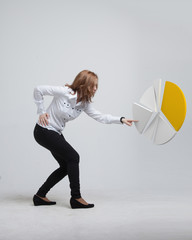 Woman shows a pie chart, circle diagram. Business analytics concept.