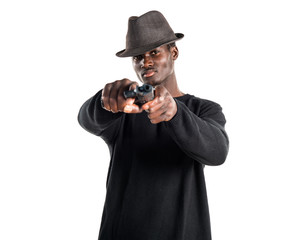 Black man holding a pistol