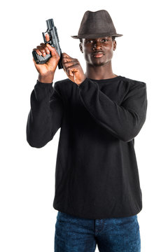 Black man holding a pistol