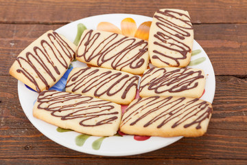 Sweet butter biscuits with chocolate topping
