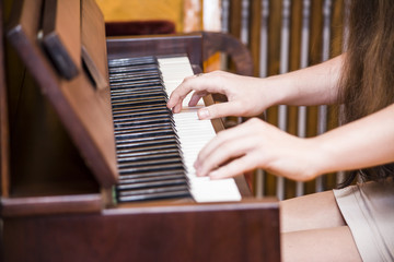 Hands playing the piano © mikitiger