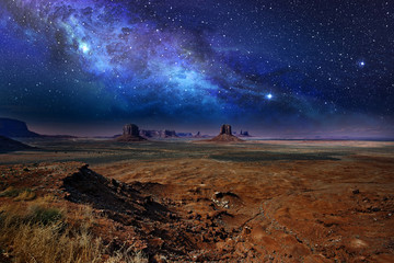 starry night sky over the monument valley - 112390807