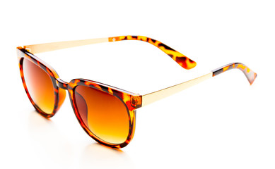 Sunglasses in leopard frame isolated on white background