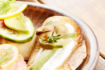 Open sandwiches with salmon and mussels