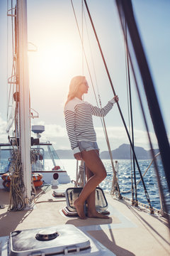 Woman standing on deck of boat