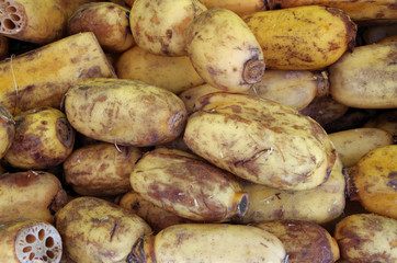 Detail of lotus root pile in market place