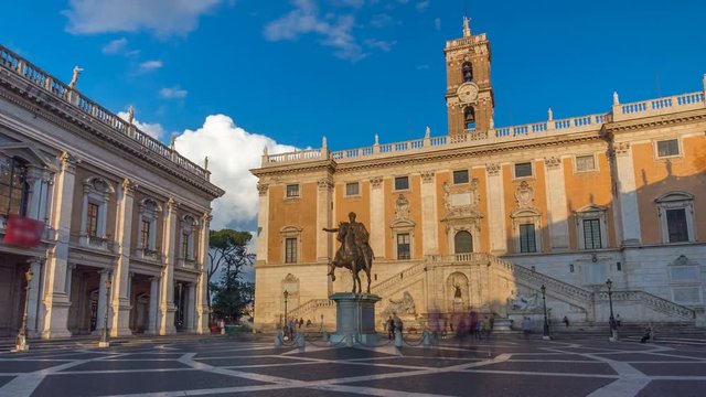 Capitoline hill landmark square timelapse hyperlapse surrounded by neo classic museums buildings with clock tower and bronze statue of Mark Aurelius