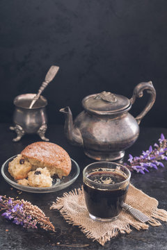 Black Coffee with cake breakfast in rustic and dark style
