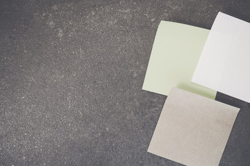 blank memos on a rough textured surface