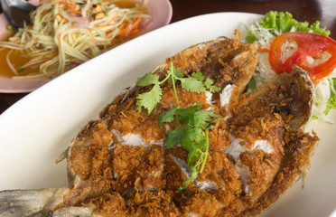 amberjack fish which dry in the sun just one day fried with panko ,served with mango salad , Thai style