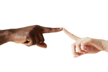 A white woman's hand and black man's hand touching with the tip of a finger. White woman and black man holding fingers together in world unity, racial love and understanding against white studio wall