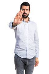 Man making stop sign