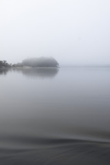 View of foggy landscape at Amazon river in Brazil. The misty scene evokes sensations of calmness, peace and tranquillity