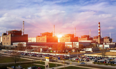 Obraz premium Nuclear energy and ecology. sunset.