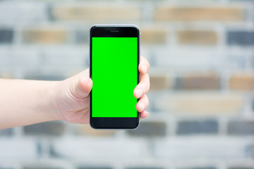 One people using one smart phone.