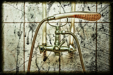 Old rusty iron hand shower.