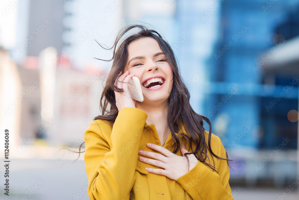 Canvas Prints smiling young woman or girl calling on smartphone