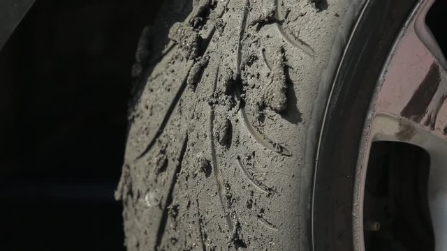 Close up slow motion shot of an old damaged  tire.