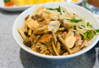 Cooked Rib-eye steak don rice and mushrooms