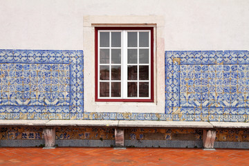 detail of Portuguese house-  window and tiled facde close-up