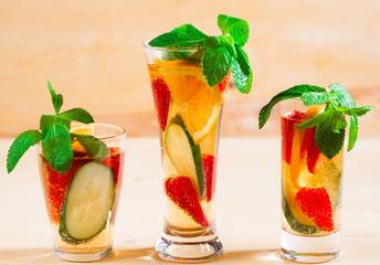 Drink. Pimms, beige wooden background