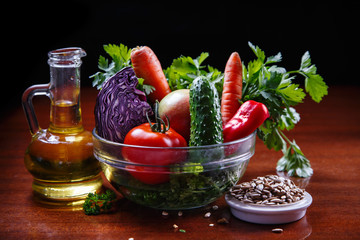 Assorted raw vegetables and fruits.