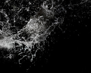 Fototapeta premium Stylish water splash. Isolated on black background