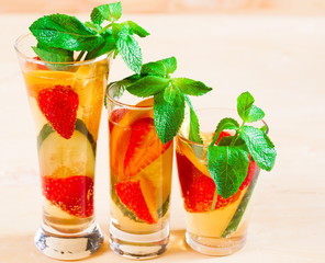 Drink. Pimms, beige wooden background