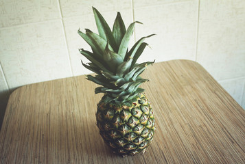 Fresh ripe pineapple on the table