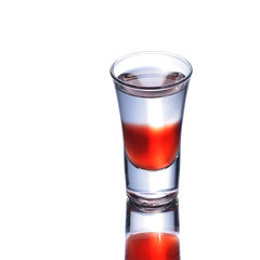 Colorful layered shot isolated on white gray gradient background with reflection. Alcohol shooter