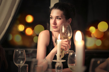 Young lady drinking wine