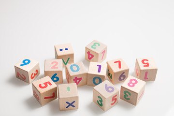 Obraz premium wooden cubes with numbers on a white background. Education and learning concept. 2017 school year.