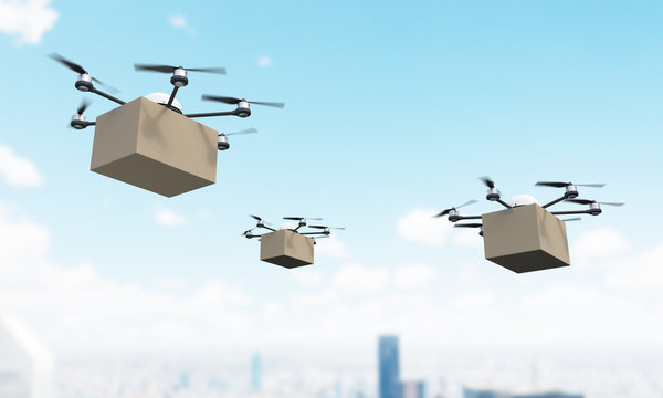 Quadrocopters with cargo over city