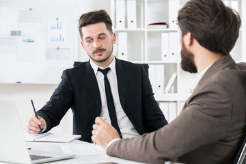 Successful businessmen discussing something