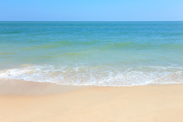 Fototapeta na wymiar Sea wave on sand beach