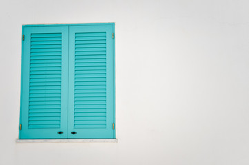 Exterior of wall house with window shutters, Portugal