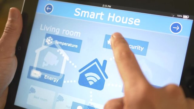 Smart house automation application on tablet iPad controling the different cameras CCTV of the building. 