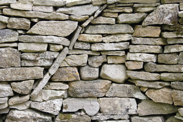 Curved circular texture pattern in a dry stone wall