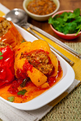 Baked Stuffed Red Bell Pepper with Meat and Rice. Selective focus.