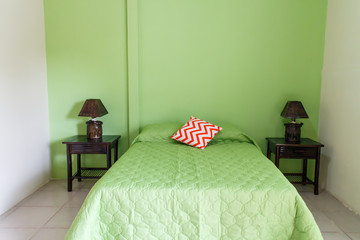green room indoor with bed