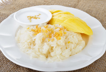 Sweet mango with sticky rice mix with coconut milk