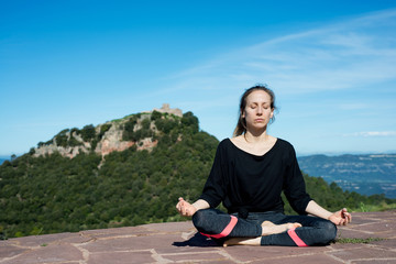 Fototapeta na wymiar Woman doing Yoga
