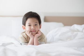 Cute asian child lying