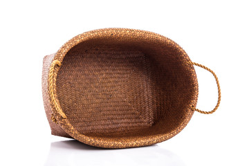 Empty wicker basket on white background